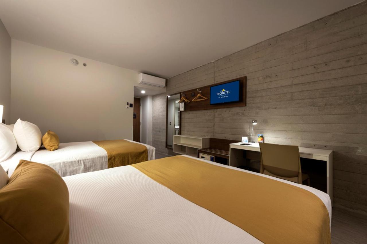 Palomar Microtel Inn & Suites By Wyndham Guadalajara Sur מראה חיצוני תמונה