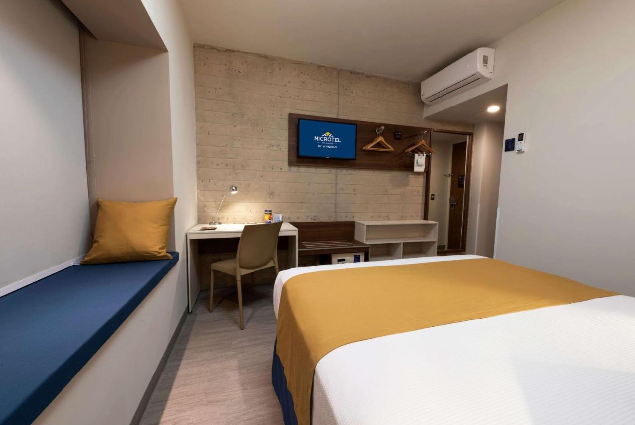 Palomar Microtel Inn & Suites By Wyndham Guadalajara Sur מראה חיצוני תמונה